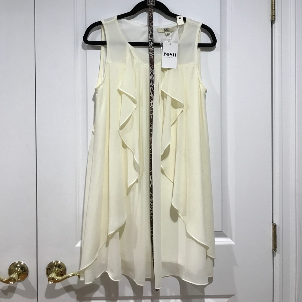 Cream ruffle dress with leopard belt